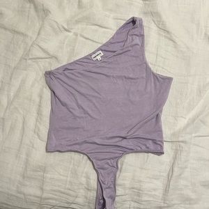One shoulder bodysuit in good condition.